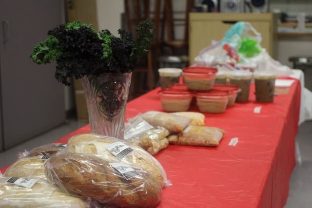 The Soup Swap 2013 spread (complete with kale bouquet) waiting to be divvied up by participants.